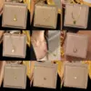 Wholesale PVD Coated Real Gold Plated Round Heart Shape Bow Knot Titanium Steel Sweet Waterproof Non Tarnish Titanium Steel Lobster Trigger Clasp Closure Necklace