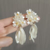 oly-d66b43a277bf45b63cb698adae02ec79 Wholesale Ser Fairy French Flower Exaerated Earrings Niche Design High-grade Long Tassel Earrings Bridal Earrings Women
