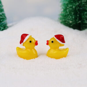 Little yellow duck in santa hat