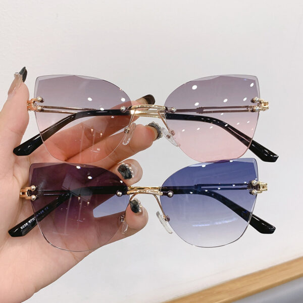 oly-d8ff7386e308b6f71c3d6150922a3852 Wholesale Cross-border in stock new frameless trim sunglasses fashion cat's eye gradient sunglasses Europe and the United States retro Internet red explosions