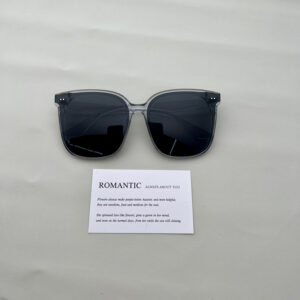 Two dots of gray gray film