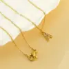 Wholesale PVD Coated 18K Gold Plated Letter Titanium Steel Simple Style Classic Style Waterproof Non Tarnish Titanium Steel Pendant Necklace