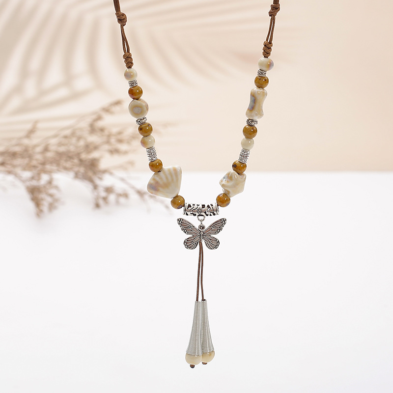 Wholesale New vintage national style ceramic necklace women's long sweater chain cross-border small jewelry aessories manufacturers