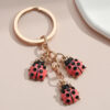 oly-d9d7388427709fa7f70474e14ed6eafc Wholesale Cartoon Insect Keychain Creative Oil Dripping Coccinella septempunctata Keychain Bag Pendant Cute Key Chain