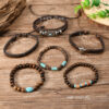 oly-d9fa16ad657f784e67c875fa142f365d Wholesale Cross-border New European and American Western Denim Style Leather Cow Tau Pine Stone Chicken Wings Coconut Shell Men's 6-piece Bracelet