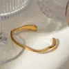 304 Stainless Steel Solid Color PVD Coated 18K Real Gold Plated Real Gold Plated Vacation Simple Style IG Style Waterproof Non Tarnish Asymmetrical Gold Cu Bracelets Wide Bracelet Bangle