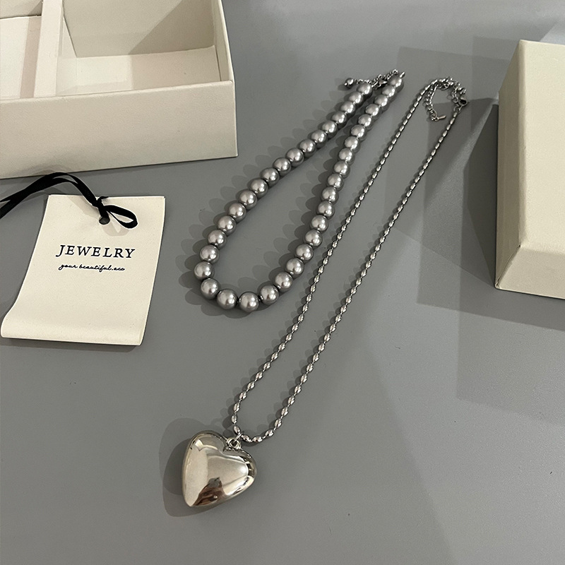 Wholesale South Korea Dongdaemun Rice Beads Titanium Steel Necklace Hollow Love Pendant G Fine Pearl Necklace Woolen Chain Women