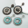 oly-dab07f7c3ed886b8c78af66cb9e8c65e Wholesale white turquoise earrings hollow round pendant exaerated party earrings