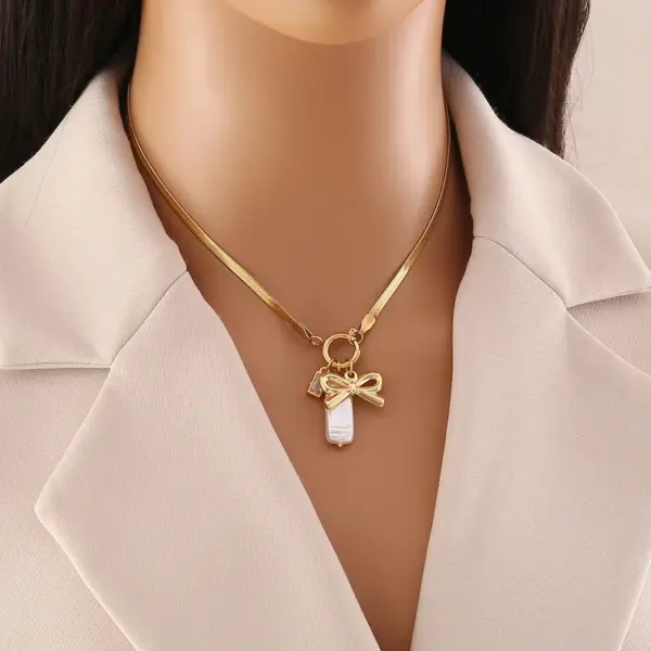 Wholesale 18K Gold Real Gold Plated 304 Stainless Steel Ion Plating (IP) Zircon Heart Shape Bow Knot Waterproof Non Tarnish Elegant Pendant Necklace For Women's