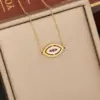 Wholesale 1 Piece Fashion Devil's Eye Stainless Steel Enamel Hollow Out Inlay Zircon Pendant Necklace