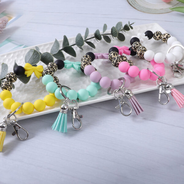 Wholesale in stock cross-border color bow leopard silicone beads beaded tassel bracelet bracelet keychain bag pendant