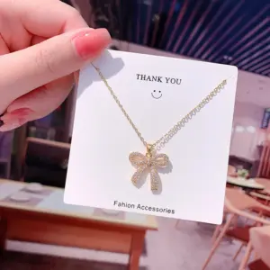 X568 Gold-Bow Knot