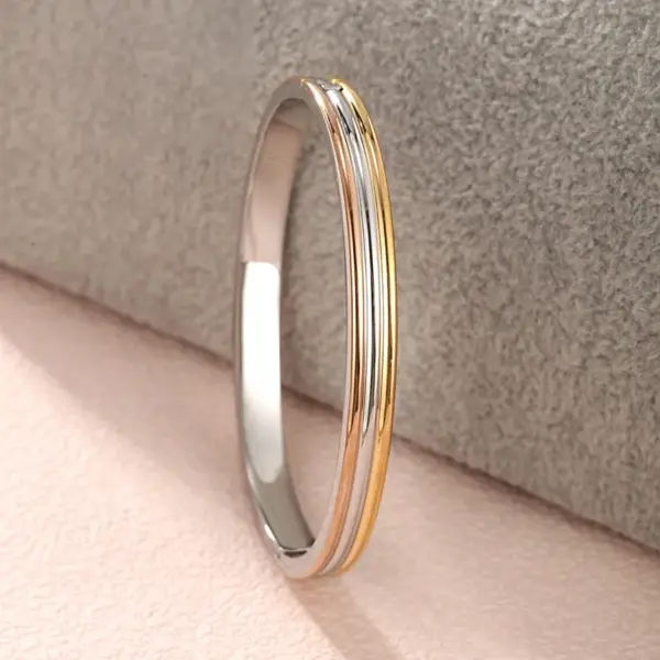 Wholesale Elegant XUPING Simple Style Color Block 304 Stainless Steel 18K Gold Plated Raw Steel Bangle In Bulk