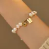 Elegant Retro Letter Heart Shape Freshwater Pearl Mixed Materials Bracelets In Bulk