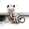 oly-dc11abbe084e3cbab7ddaf4b0a821961 Wholesale New Color Diamond-Encrusted Cartoon Cat Creative Metal Keychain Pendant Car Pendant Factory Direct Supply Small Gifts
