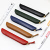 Wholesale Solid color leather pencil case leather zipper stationery bag