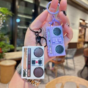Wholesale Creative retro radio keychain mini musical instrument car key chain bag pendant claw machine small gift