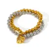 Wholesale Luxurious Double Layer Heart Shaped Pendant Beaded Bracelet 18K Gold Plated Stainless Steel Elastic Line For Women Casual Classic Style