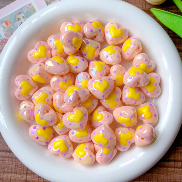 oly-dc866439e9fc88cb8aa4c00327f638e0 Wholesale Acrylic Hand-painted Cut-out Luminous Love Beads