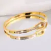 Wholesale 304 Stainless Steel Geometric Solid Color PVD Coated Rhinestones Real Gold Plated 18K Gold Hip-Hop Waterproof Non Tarnish Bangle
