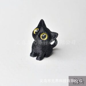 Black Cat - Crouching Down and Looking Up