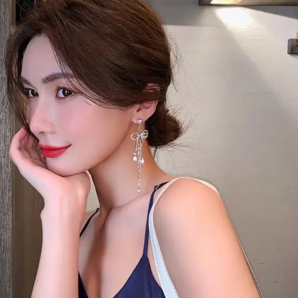 Wholesale Retro Geometric Star Bow Knot Copper Inlay Zircon Drop Earrings 1 Pair
