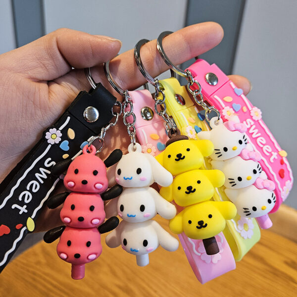 oly-de2f5f5d262621dd8a61d920b5c340d4 Wholesale Sanrio Yugui dog jengle keychain cute cartoon melody pudding dog PVC doll bag pendant