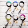oly-de937d26b70906e89fd3f7b4c40a8fd1 Wholesale Western Style Dairy Wood Beads Silicone Beaded Round Wood Pieces Yak Keychain