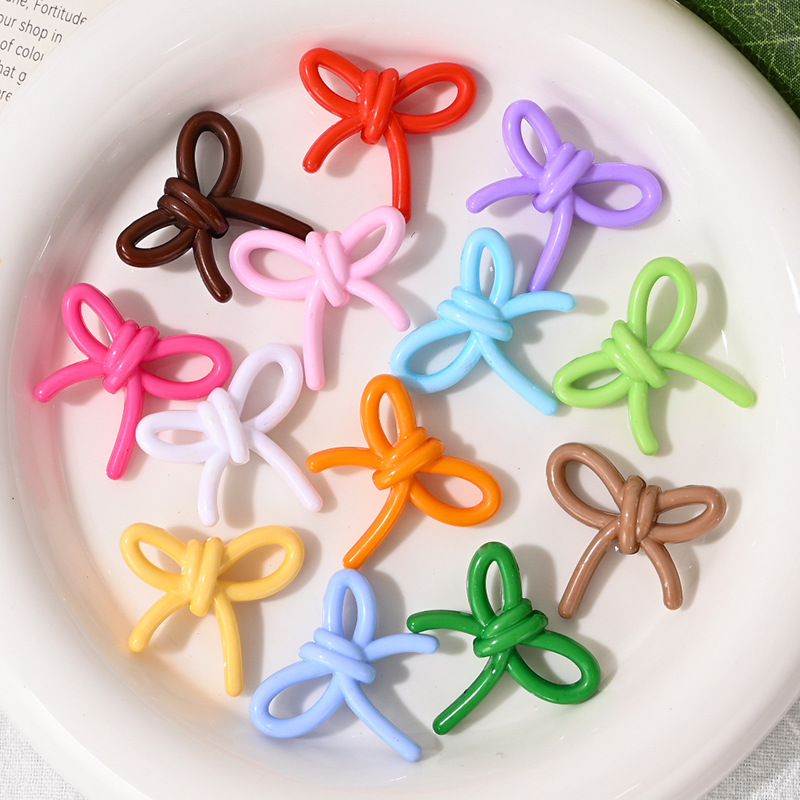 Wholesale Acrylic bow beads with through holes