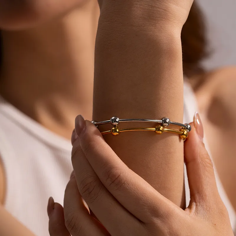 Wholesale Stainless Steel Solid Color PVD Coated Real Gold Plated Elegant Waterproof Non Tarnish Gold Cu Bracelets