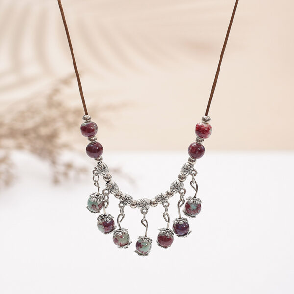oly-e037d08c03d10b4c8d5940b71d092e10 Wholesale vintage national style ceramic necklace women's long sweater chain small jewelry aessories manufacturers