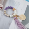 oly-e18b3c4234f63027e90d0fdf7e72e873 Wholesale Silicone Beads Tassel Wood Beads Wrist Keychain