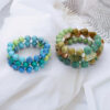 oly-e201b5461643b53beafc61b49e56b313 Wholesale temu, a brand new cross-border Bohemian style acrylic natural stone beaded bracelet with multi-layer elastic bangle.
