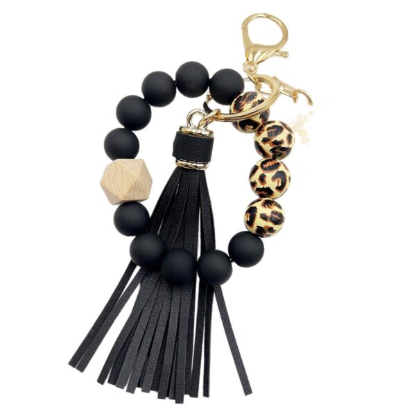 oly-e21e86469b64bf318ad0a72d9193b825 Wholesale Silicone Beads Tassel Wood Beads Wrist Keychain