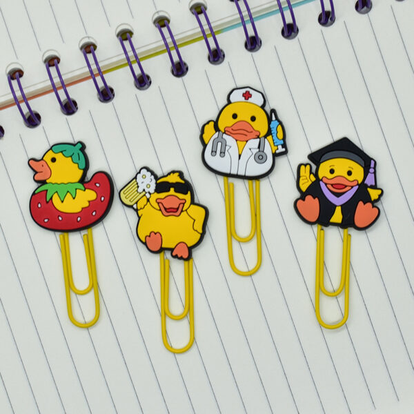 oly-e2549d82df6fc78777f28f2b735c4bb3 Wholesale Random 50pcs Little Yellow Duck Metal Soft Rubber Paperclip Bookmarks