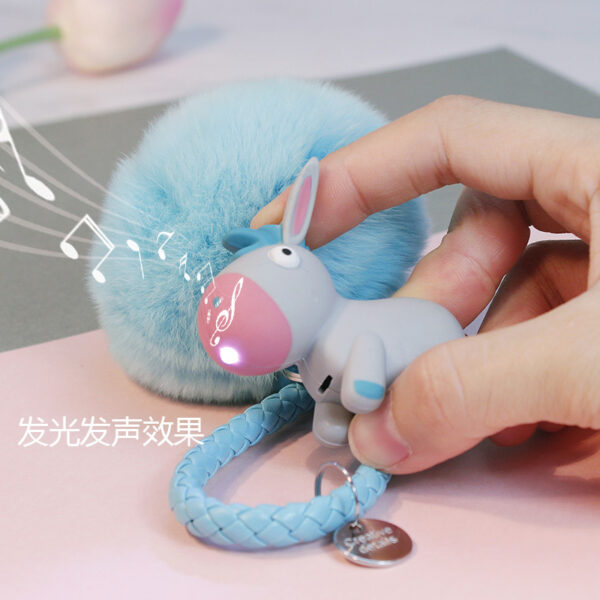 Wholesale Sound luminous cartoon donkey silly keychain children's schoolbag pendant luggage accessories toy manufacturers spot