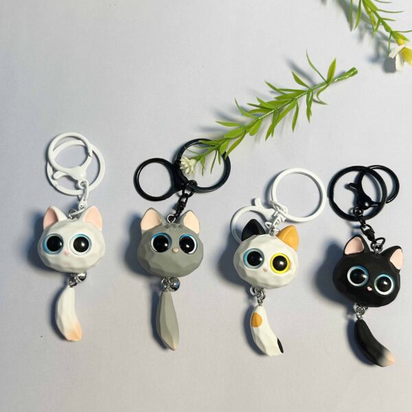 Wholesale Explosions creative resin big eye cat head key chain couple bag car pendant student New Year gift