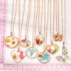 Wholesale Bohemian natural dried flower geometric polygon butterfly necklace epoxy pastoral style small floral pendant