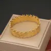 Wholesale PVD Coated 18K Gold Real Gold Plated Tree Leaves Eye Stainless Steel Casual Waterproof Non Tarnish Bangle