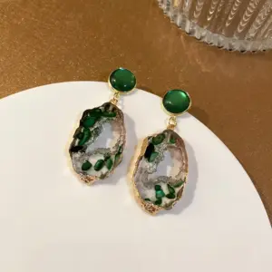 Steel needle. Emerald.