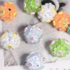 oly-e414078c46cccd2baf1033f8ee31e17a Wholesale Smiley sunflower beads can be strung with straight holes to make DIY phone keychains and jewelry.