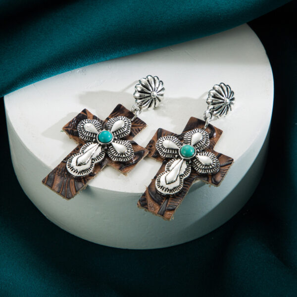 oly-e475c79a9ef4886b89f7b98f7a2607a8 Wholesale Exaerated Cross Earrings with Inlaid Turquoise Leather