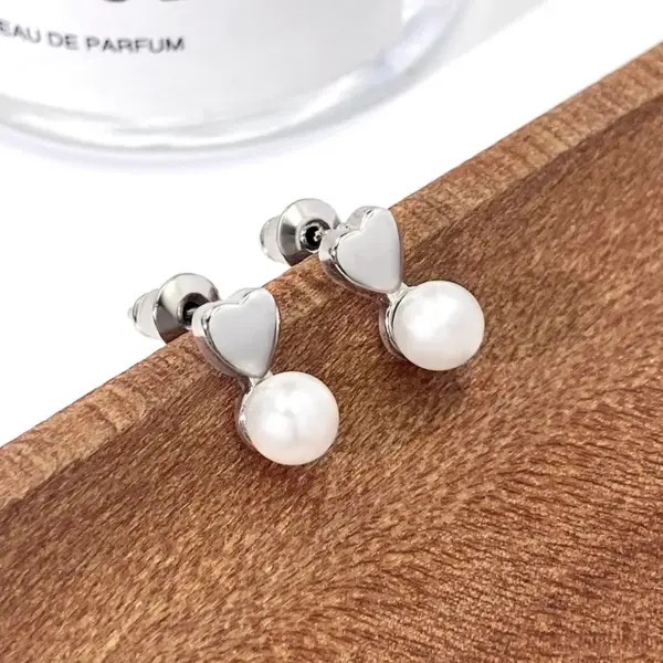 Wholesale 1 Pair Elegant Simple Style Round Star Heart Shape Plating Copper Pearl Zircon Ear Studs