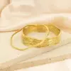 Wholesale Ion Plating (IP) 18K Gold Plated Curve 304 Stainless Steel Simple Style Waterproof Non Tarnish 304 Stainless Steel Bangle