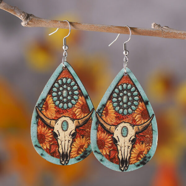 oly-e53711774eba5a6cbb7d90a77fd4152f Wholesale Western-style turquoise suower bull head earrings