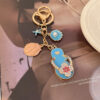 Wholesale Cute diamond-encrusted slippers car keychain metal bag pendant key chain gift