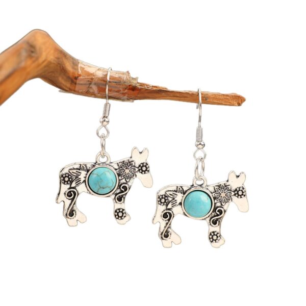 oly-e7a48efe56c15f7ddfd9f2e9566384ee Wholesale New Retro Alloy Blue Turquoise Horn Earrings European and American Western Cowboy Creative Bull Head Earrings