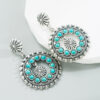 oly-e90167d7b109f5c0bbdc2b329af0a694 Wholesale white turquoise earrings hollow round pendant exaerated party earrings