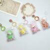 Wholesale Mini Labubu flocked fabric bag/backpack charm, cute keychain/gift charm.