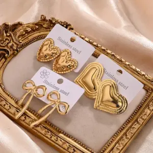 Wholesale Electroplating Golden Plated Heart Shape Bow Knot 304 Stainless Steel IG Style Casual Vacation Polishing Plating Ear Studs